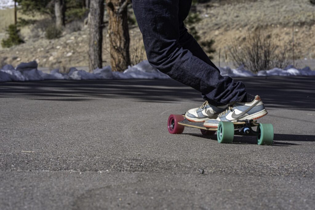 Pantheon Owner Jeff Vyain Rides a Trip down a hill in the neighborhood