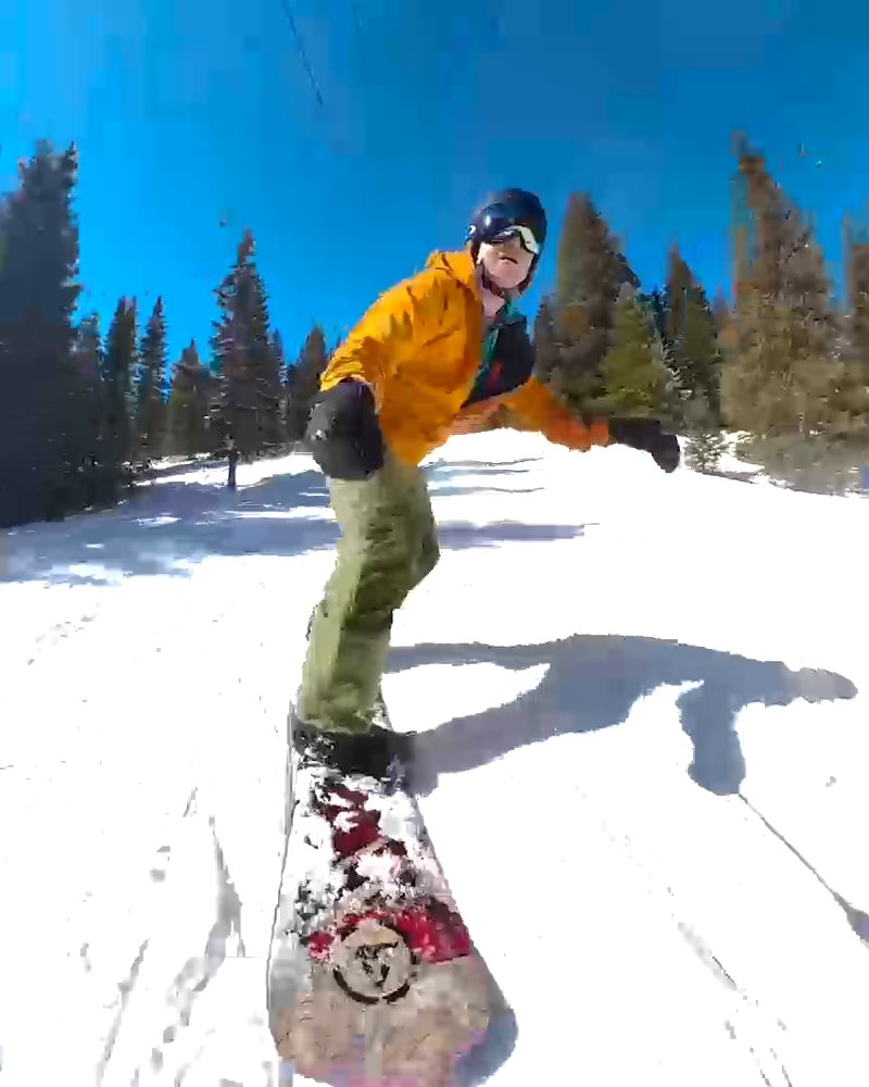 Riding the Pantheon Boreas snowboard on a groomed run at Breckenridge