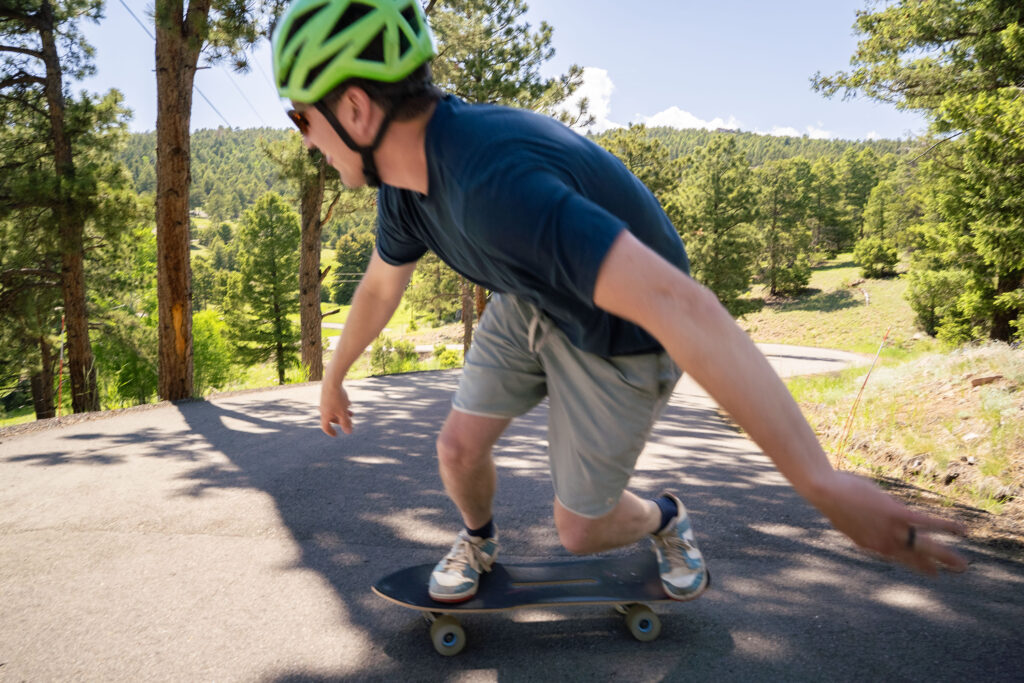 Jeff Vyain carving the Pantheon Shuriken surf skate on a mountain road